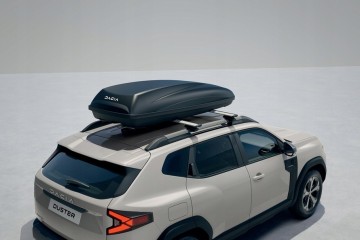 QuickFix roof crossbars mounted on DUSTER III fixed rails