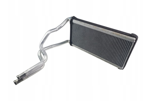 Núcleo del calentador para salpicadero Subaru Legacy Outback 72130AG010 original nuevo 2