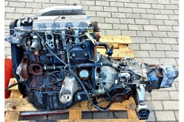 SILNIK KOMPLETNY SKRZYNIA AUDI 100 2 5TDI 046130147