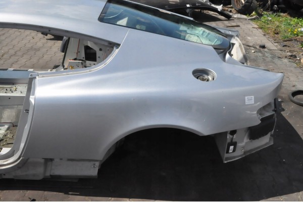 ASTON MARTIN DB9 COUPE 2005r QUARTER MUD LEFT RIGHT REAR BELT BATHTUB DUP Part manufacturer Aston Martin