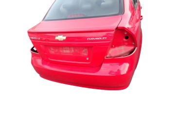 ROJO PARAGOLPES TRASERO CHEVROLET AVEO BERLINA LT 2010 ROJO 212223 CHEVROLET - 1